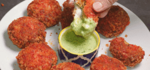 kabab in a serving plate with mint chutney